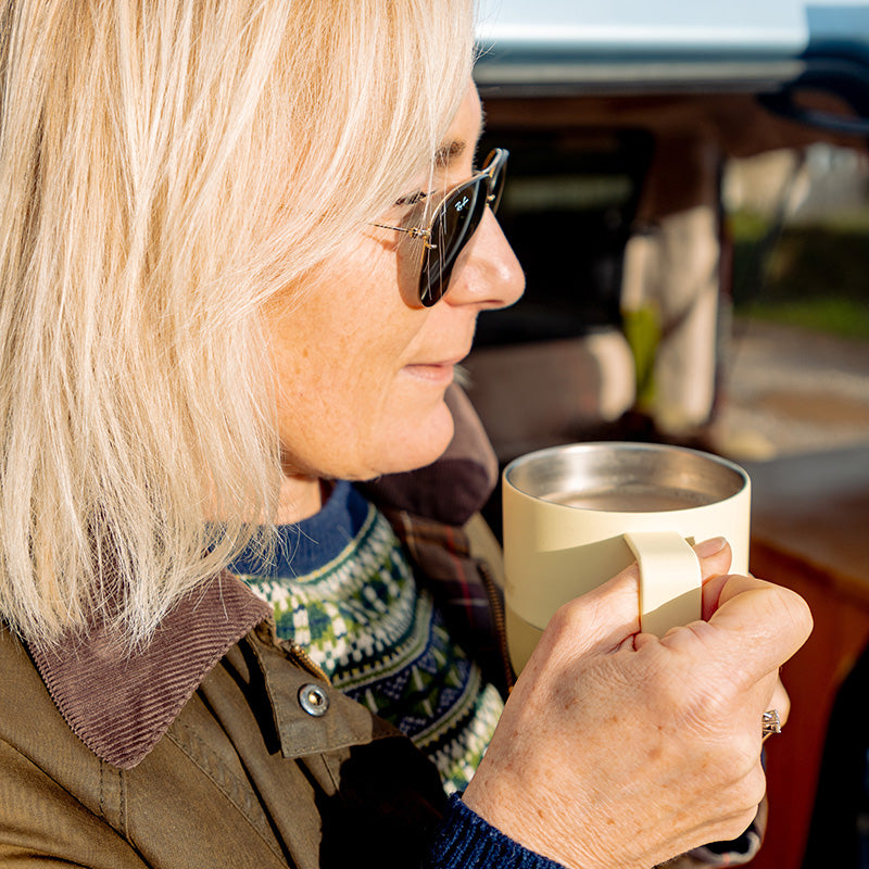 12oz-rise-mug-g8 12oz_rise_coffee_mug_wax_yellow_woman_drink_closeup_square.jpg