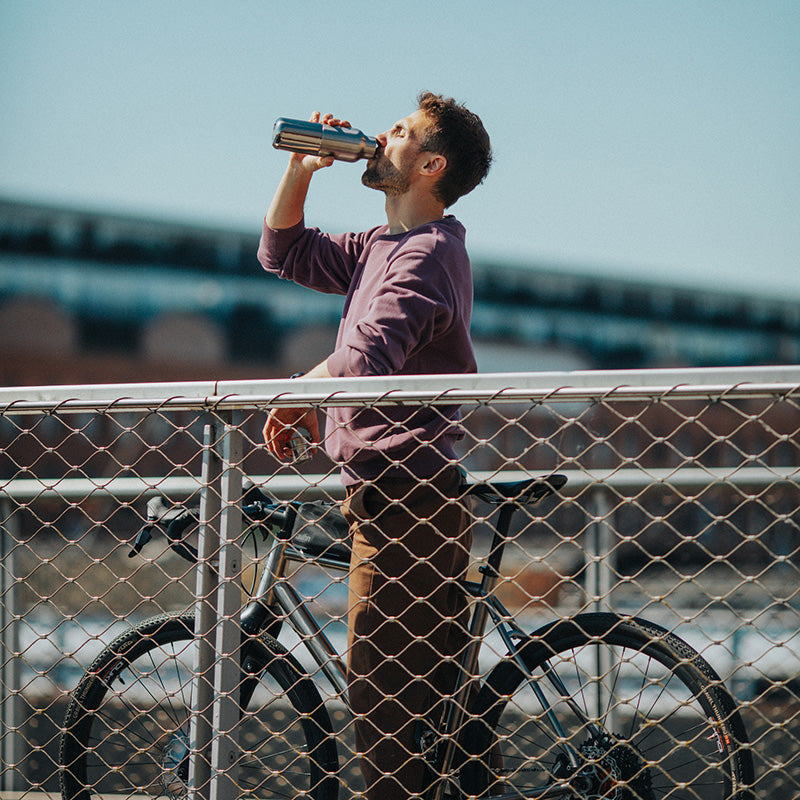 12oz-rise-reflect-with-bamboo-cap-c1 16oz_rise_reflect_man_bike_square.jpg