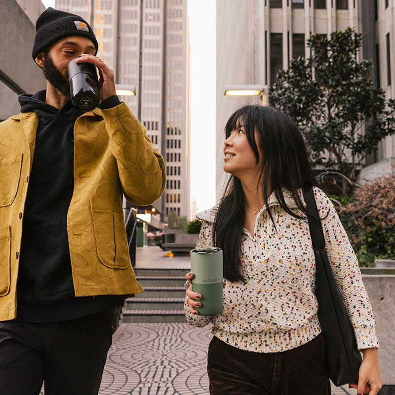bring-your-own-party-kit-pints-and-tumblers-w2 16oz_rise_tumbler_black_iceberg_couple_drink_city_street_square.jpg