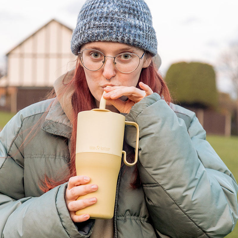 26oz-rise-tumbler-with-straw-lid-f7 26oz_rise_rumbler_straw_wax_yellow_woman_sip_square.jpg