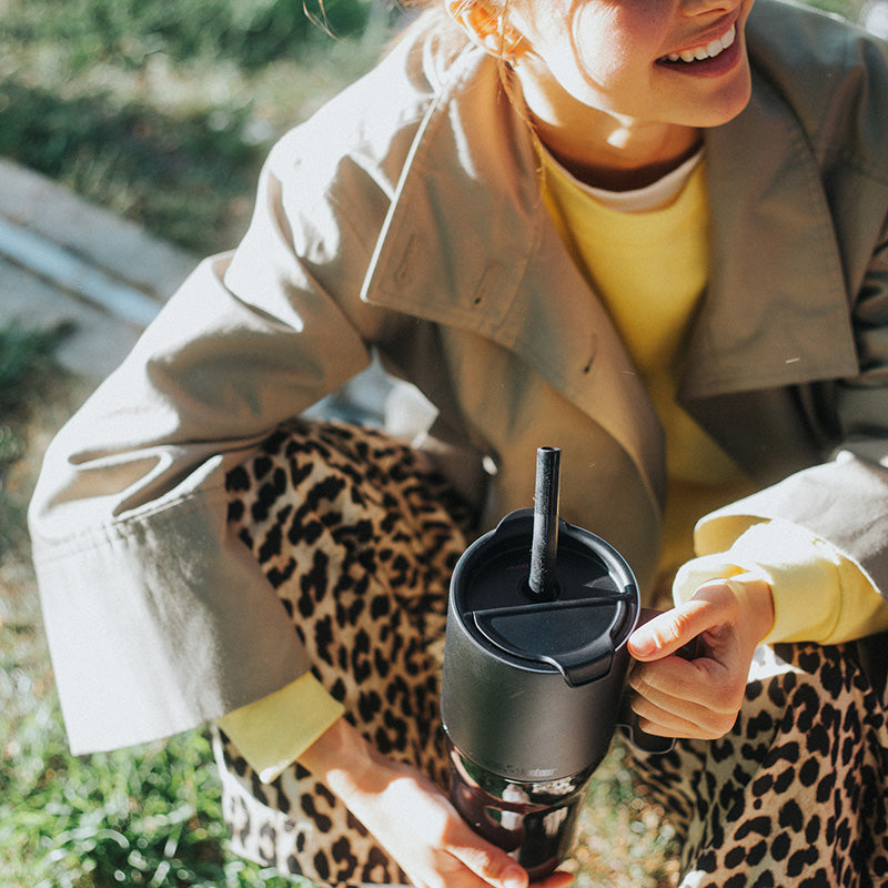 26oz-rise-tumbler-with-straw-lid-f7 26oz_rise_tumbler_black_woman_topview_square.jpg