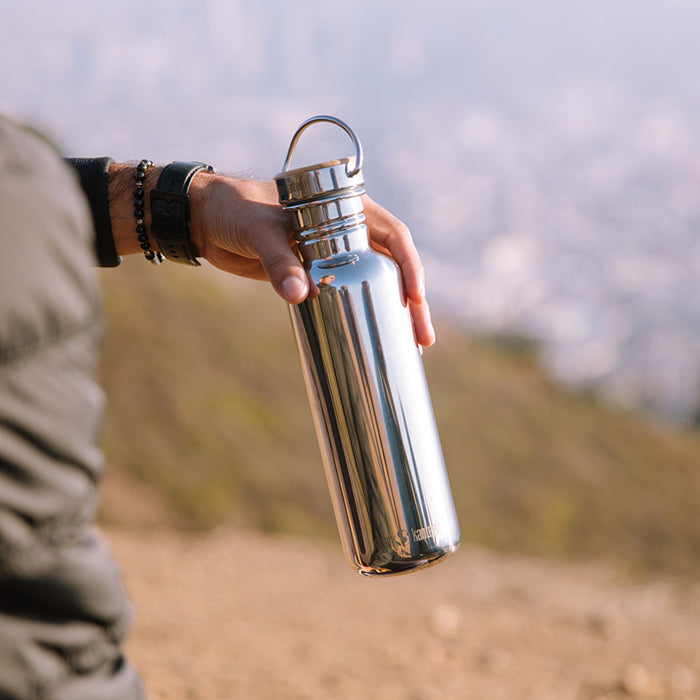 27oz-reflect-with-bamboo-cap-s5 K27SSLRF-MS-BAMBOO_reflect_bottle_hand_lifestyle.jpg