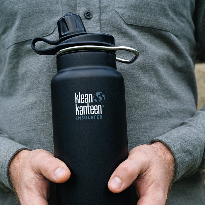 tkwide-chug-cap-p6 K32TKWSSL-SB-Craddled-Bottle_closeup_lifestyle.jpg